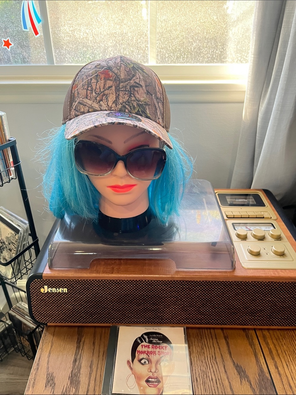 Camo Trucker Hat with Bright Blue Wig and Sunglasses